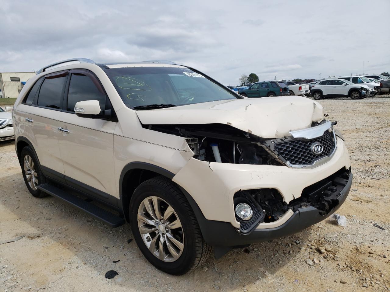KIA SORENTO EX 2011 with VIN 5XYKU4A29BG116699 - Photo from auction