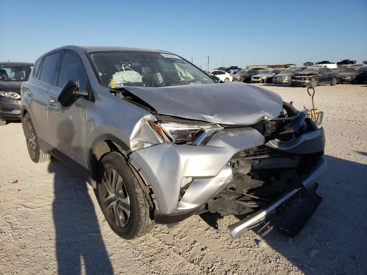Photo 9 from auction – 2018 TOYOTA RAV4 LE with VIN JTMZFREV9JJ190052