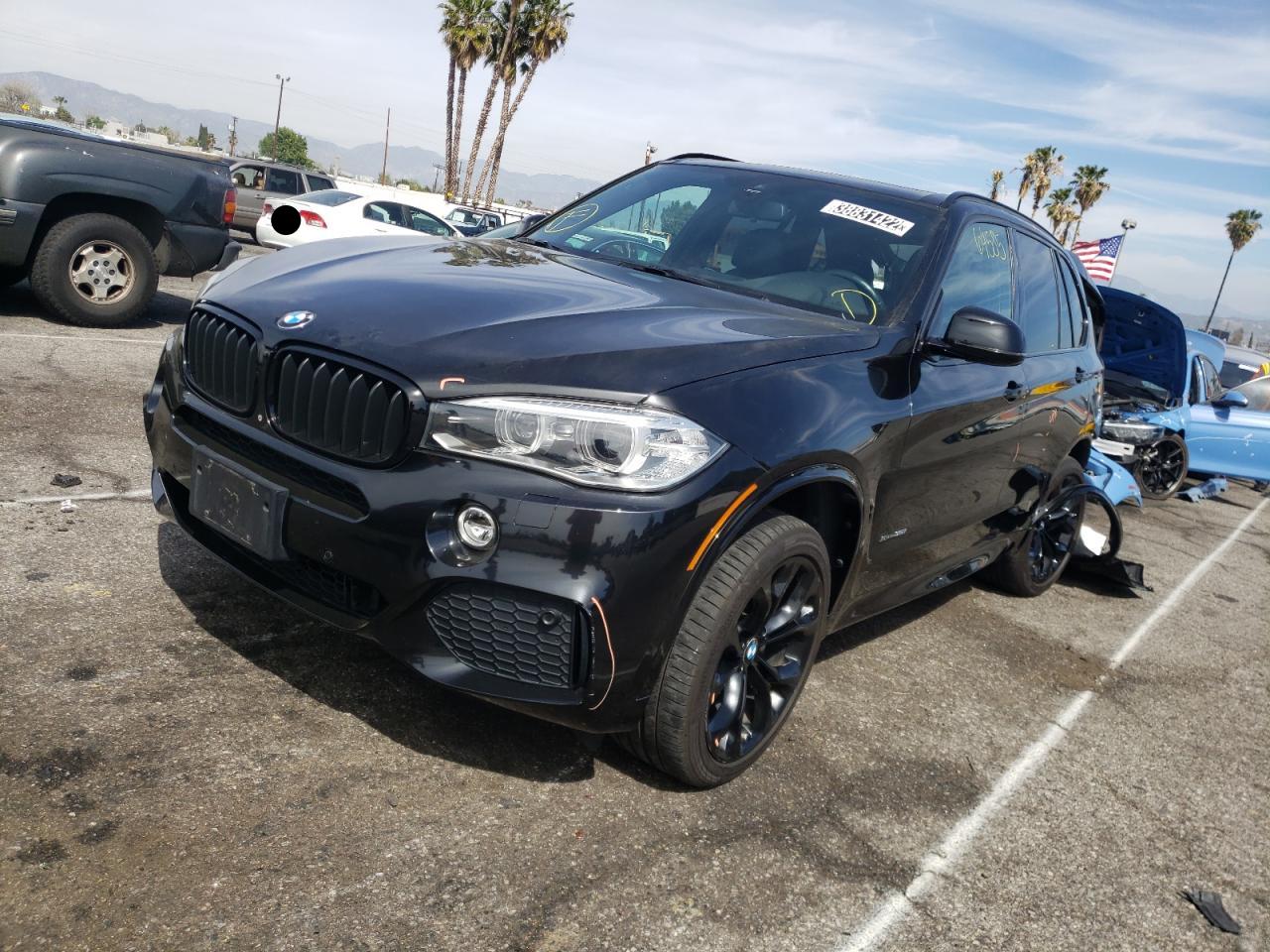 Photo 2 from auction – 2014 BMW X5 XDRIVE3 with VIN 5UXKR0C57E0H21382