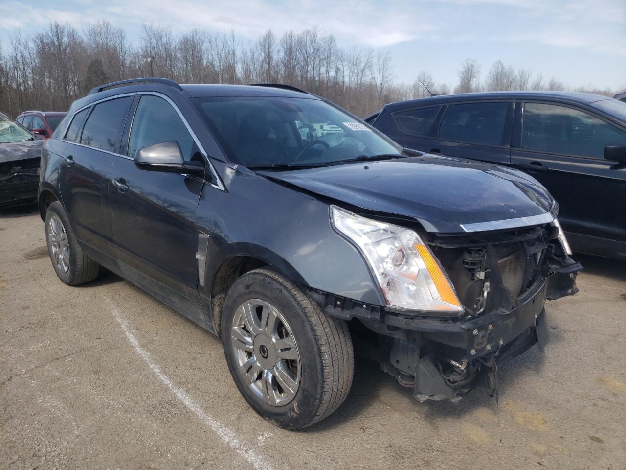 CADILLAC SRX 2011 with VIN 3GYFNGEY3BS599615 - Photo from auction