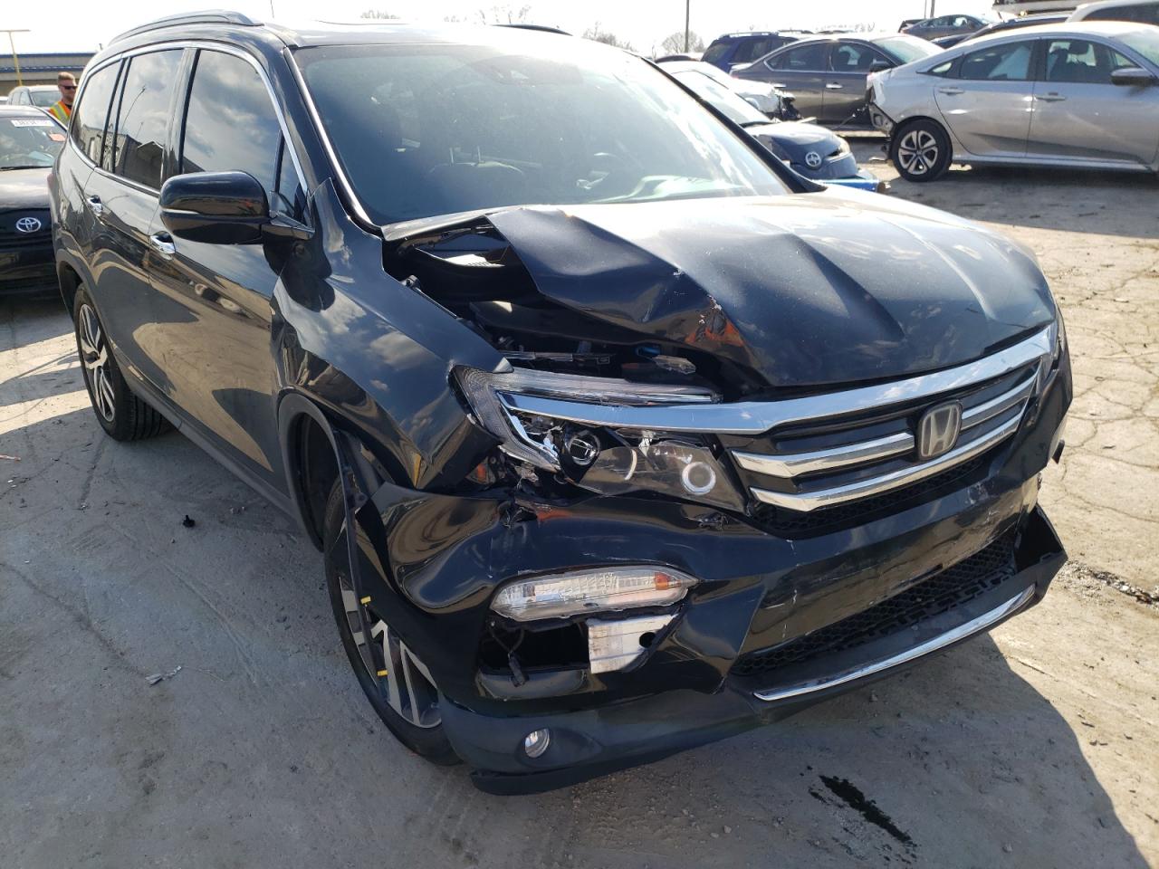 HONDA PILOT ELIT 2016 with VIN 5FNYF6H01GB002523 - Photo from auction