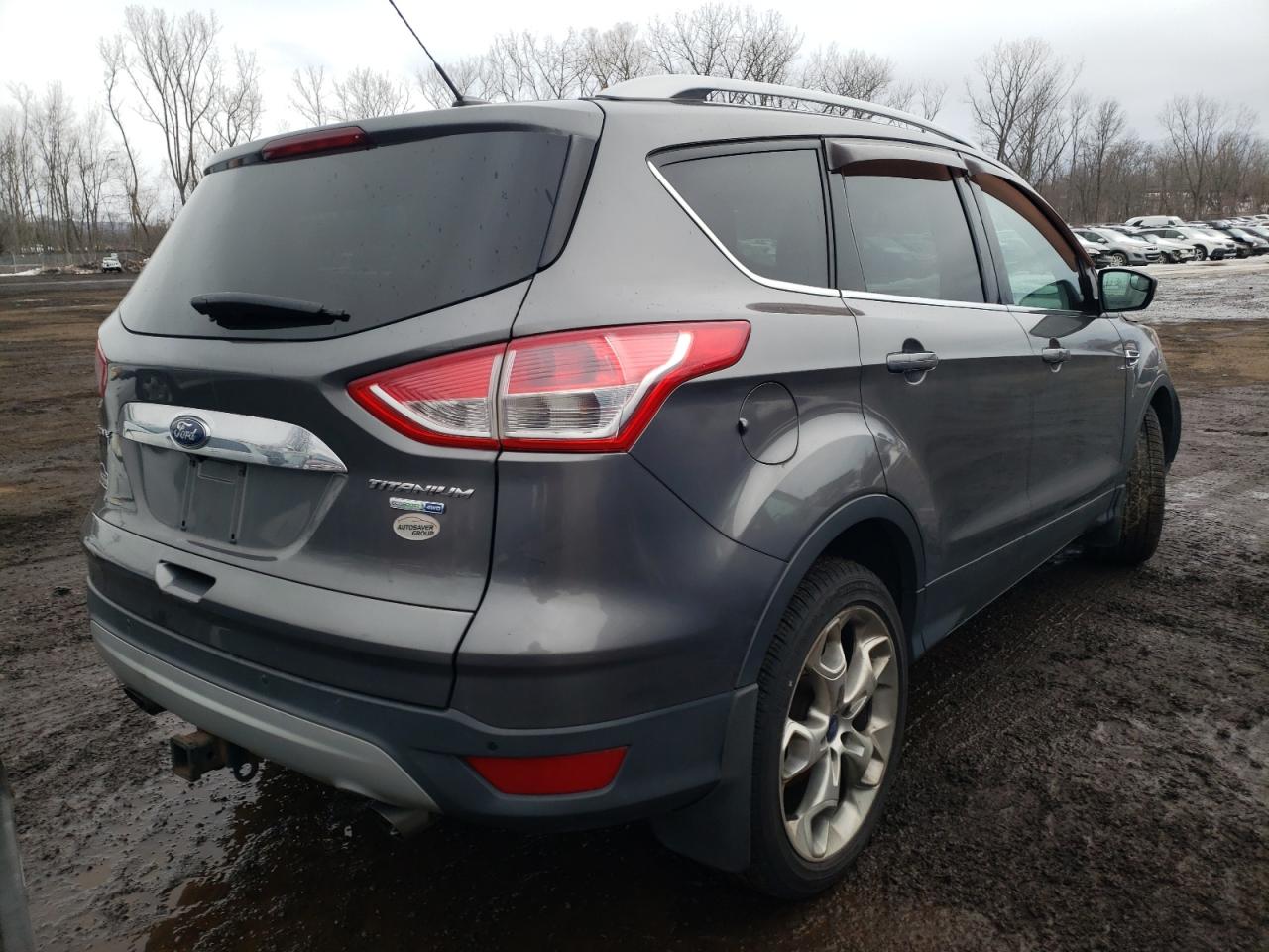 Photo 4 from auction – 2014 FORD ESCAPE TIT with VIN 1FMCU9J90EUA65333