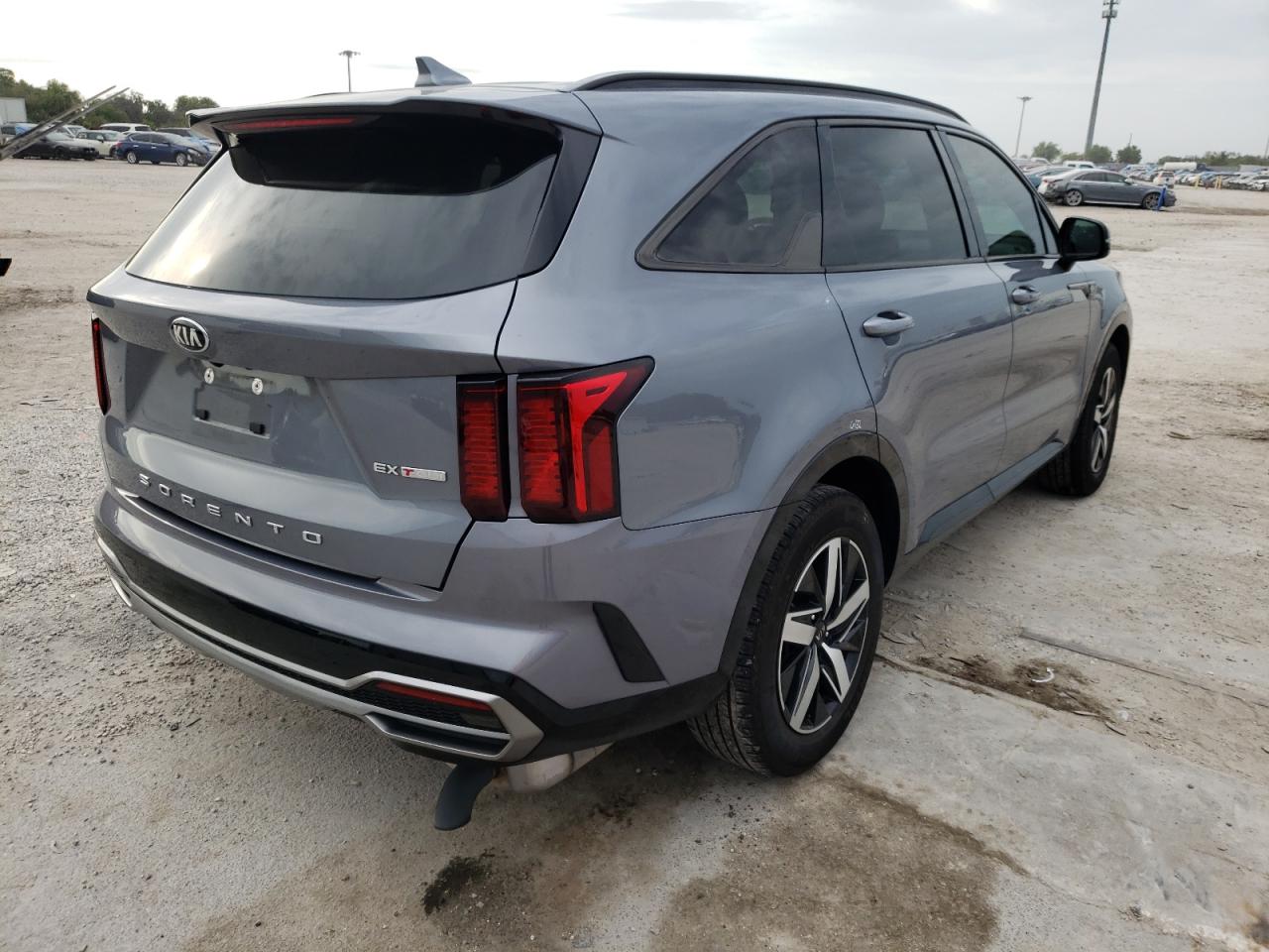 Photo 4 from auction – 2021 KIA SORENTO EX with VIN 5XYRH4LF7MG033200