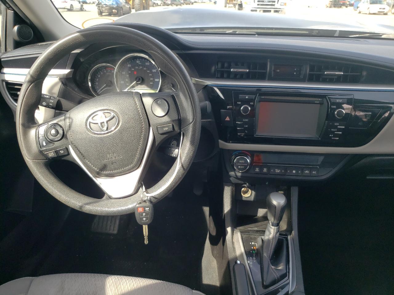 Photo 9 from auction – 2014 TOYOTA COROLLA L with VIN 5YFBURHE8EP049039