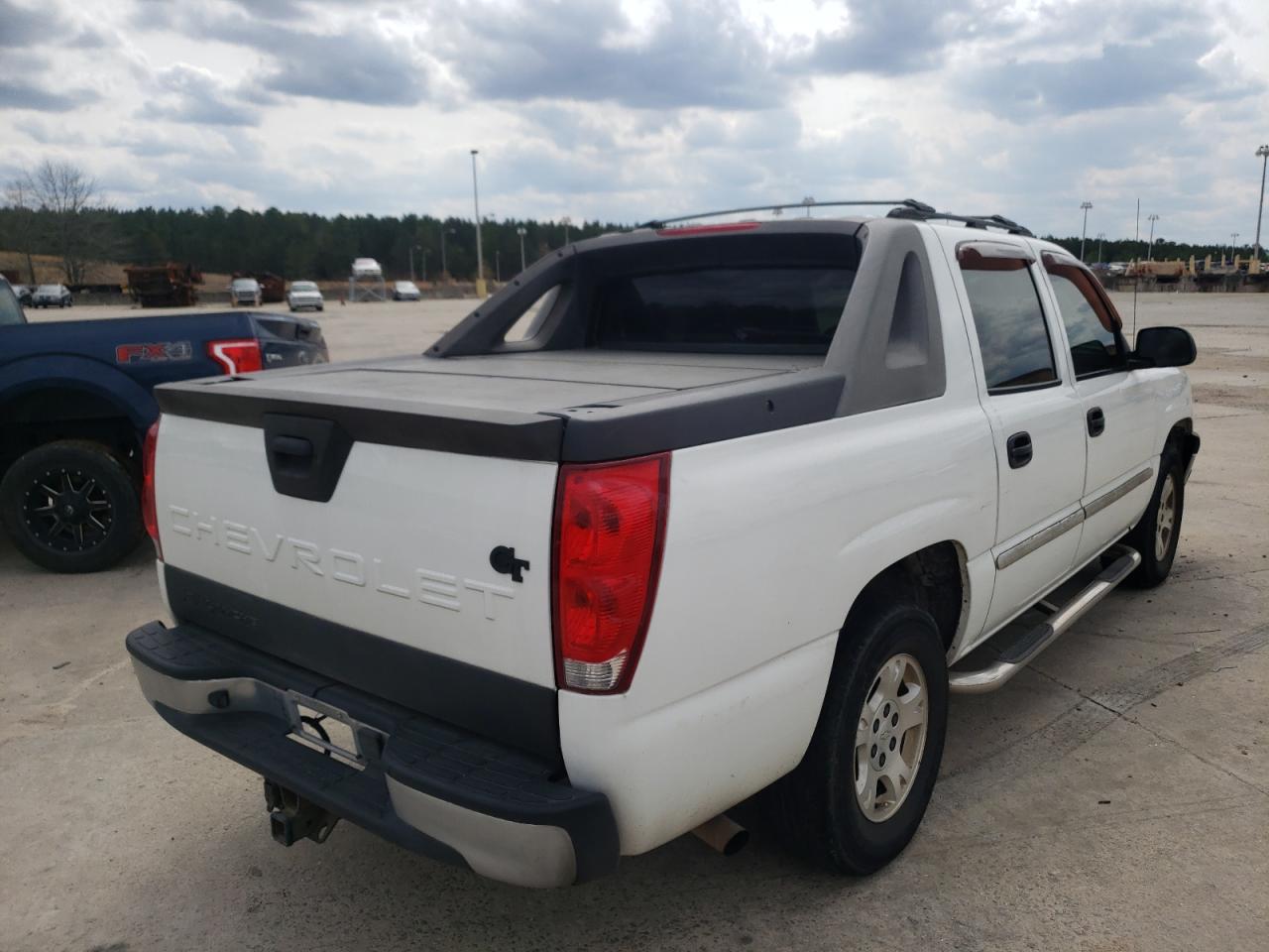 Photo 4 from auction – 2003 CHEVROLET AVALANCHE with VIN 3GNEC13T93G295924