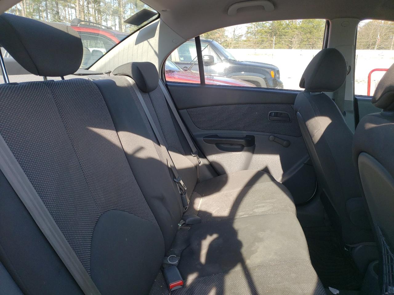 Photo 6 from auction – 2011 KIA RIO BASE with VIN KNADH4A31B6944753