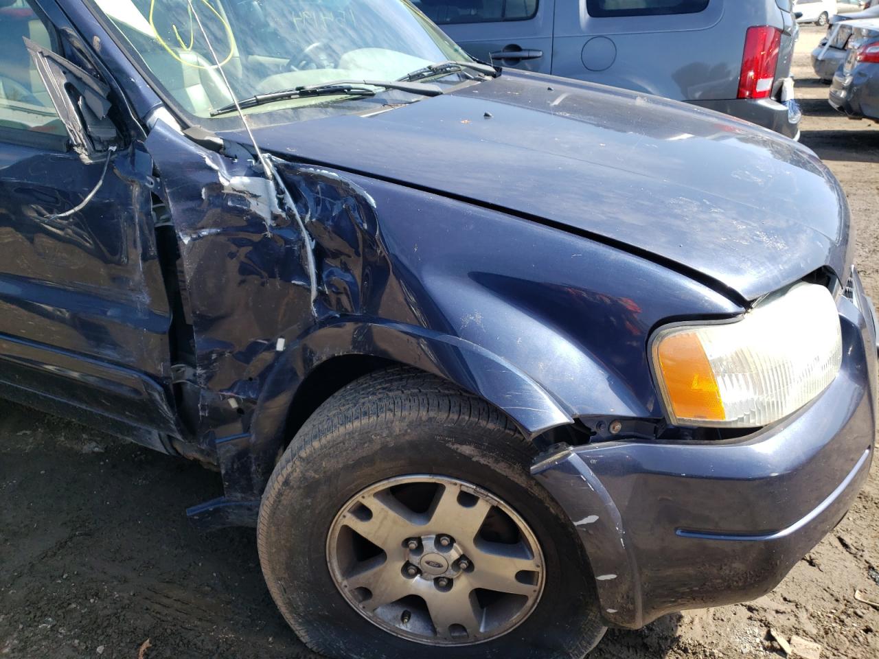 Photo 9 from auction – 2004 FORD ESCAPE LIM with VIN 1FMCU94144KB52569