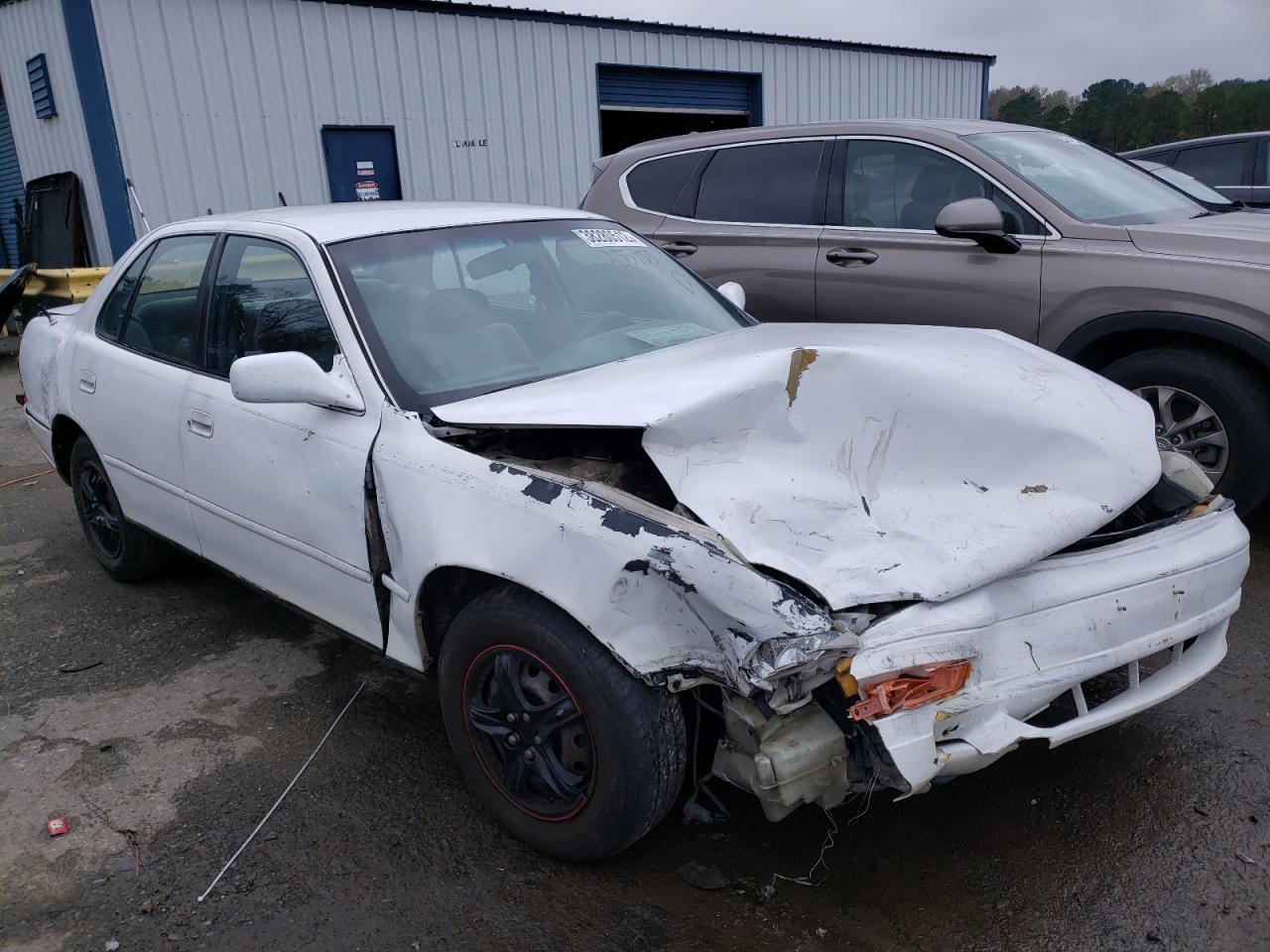 TOYOTA CAMRY LE 1994 with VIN JT2SK12E9R0255155 - Photo from auction