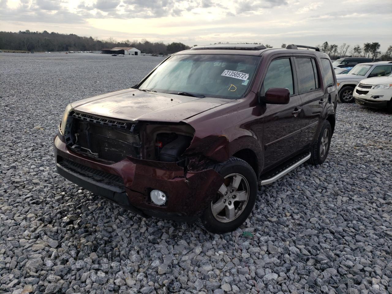 Photo 2 from auction – 2011 HONDA PILOT EXLN with VIN 5FNYF3H78BB014706