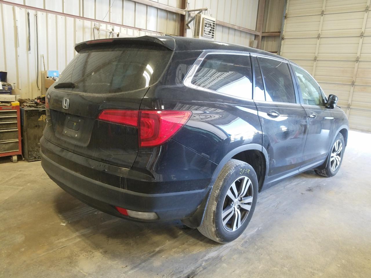 Photo 4 from auction – 2016 HONDA PILOT EXLN with VIN 5FNYF5H74GB050654