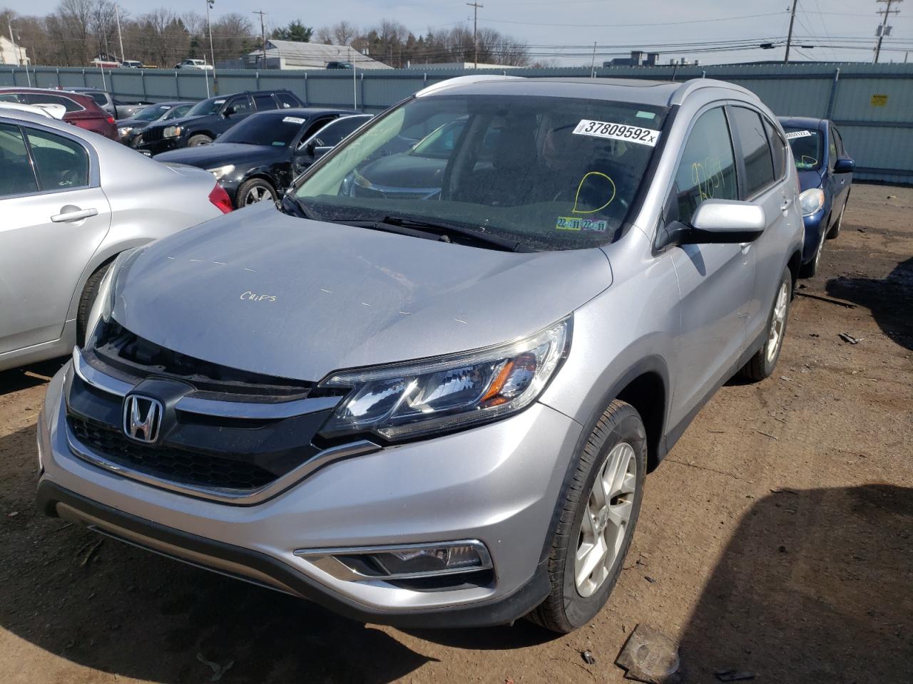 Photo 2 from auction – 2016 HONDA CR-V EXL with VIN 2HKRM4H75GH663193