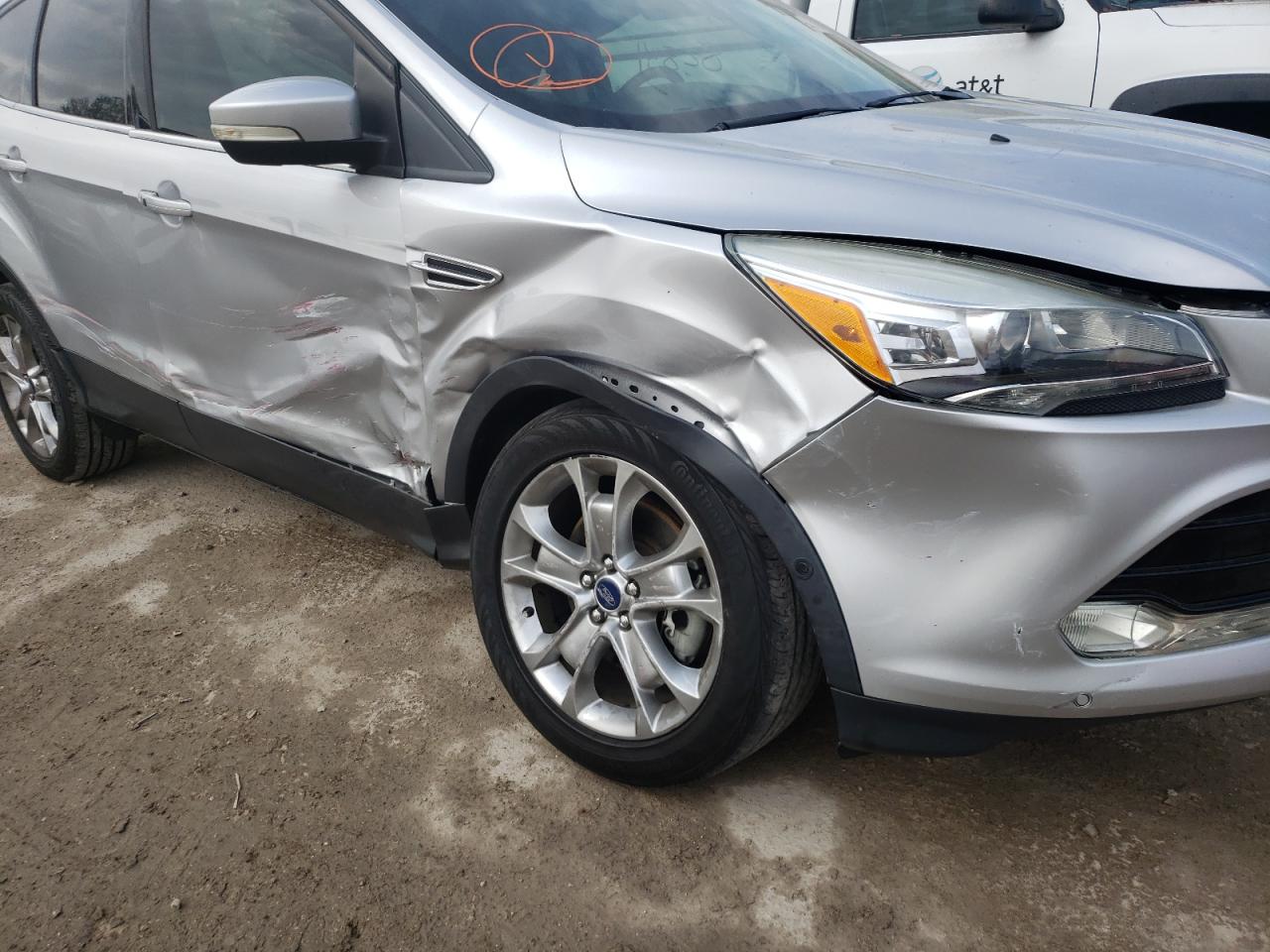 Photo 9 from auction – 2014 FORD ESCAPE TIT with VIN 1FMCU9JX1EUA82446
