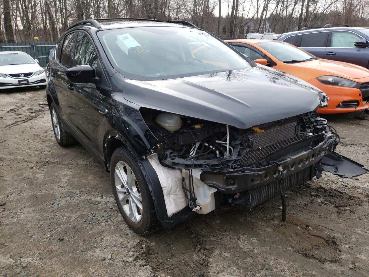 Photo 9 from auction – 2017 FORD ESCAPE SE with VIN 1FMCU9GD4HUD23269