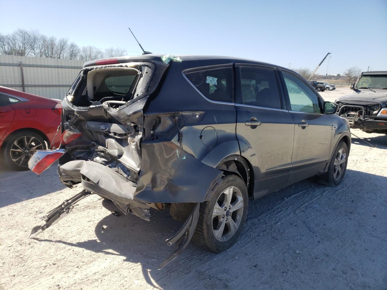 Photo 4 from auction – 2016 FORD ESCAPE SE with VIN 1FMCU9G95GUC63092