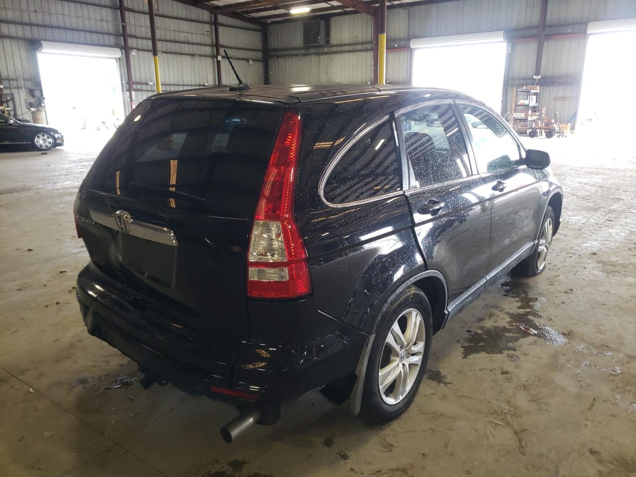 Photo 4 from auction – 2011 HONDA CR-V EXL with VIN JHLRE3H70BC010950