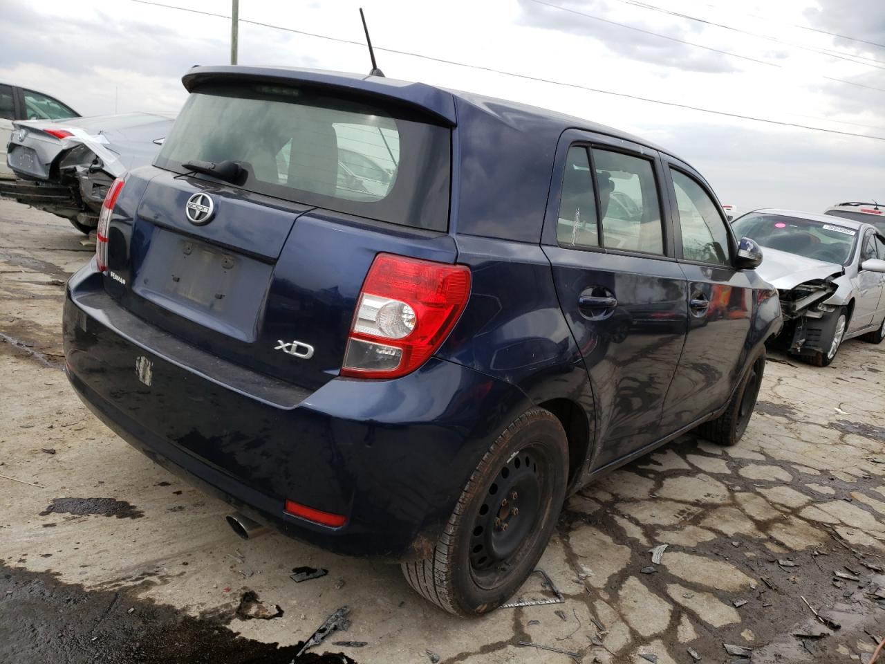 Photo 4 from auction – 2014 TOYOTA SCION XD with VIN JTKKUPB46E1045539
