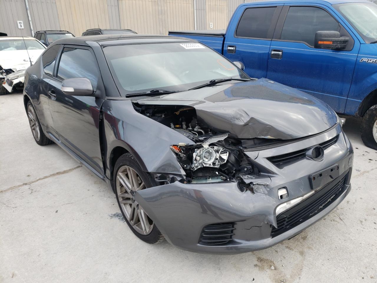 TOYOTA SCION TC 2011 with VIN JTKJF5C78B3013033 - Photo from auction