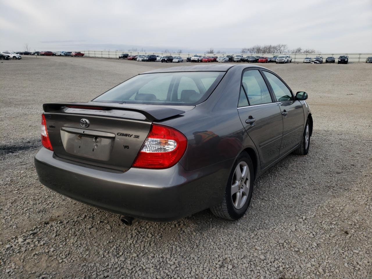 Photo 4 from auction – 2002 TOYOTA CAMRY LE with VIN 4T1BF30K72U509911