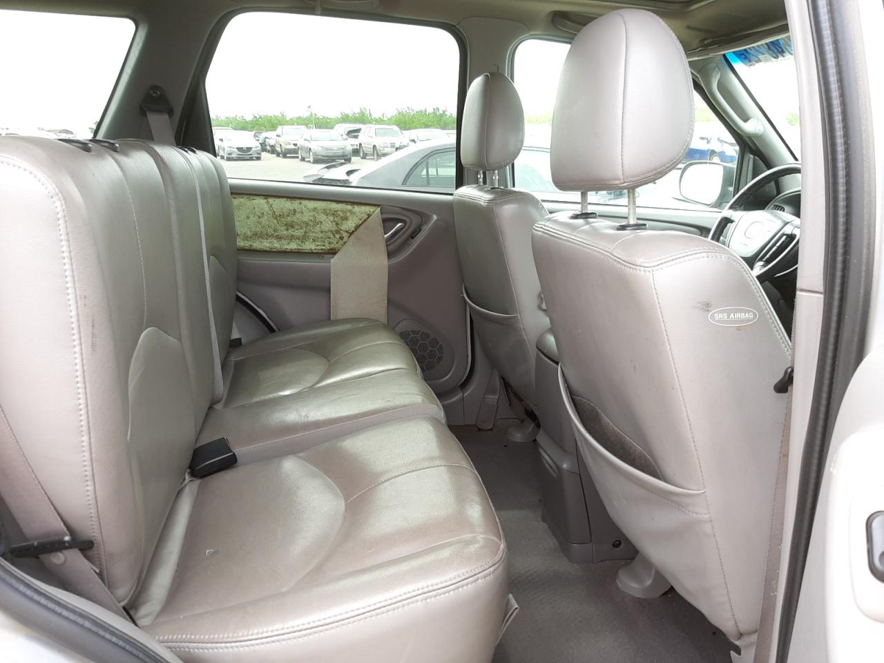 Photo 6 from auction – 2002 MAZDA TRIBUTE LX with VIN 4F2CU09142KM51694