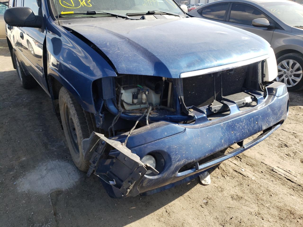 Photo 9 from auction – 2006 GMC ENVOY with VIN 1GKDT13S262223038