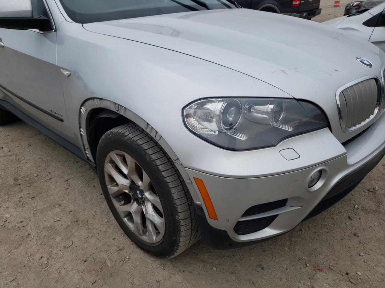 Photo 9 from auction – 2013 BMW X5 XDRIVE3 with VIN 5UXZV4C50D0E03460
