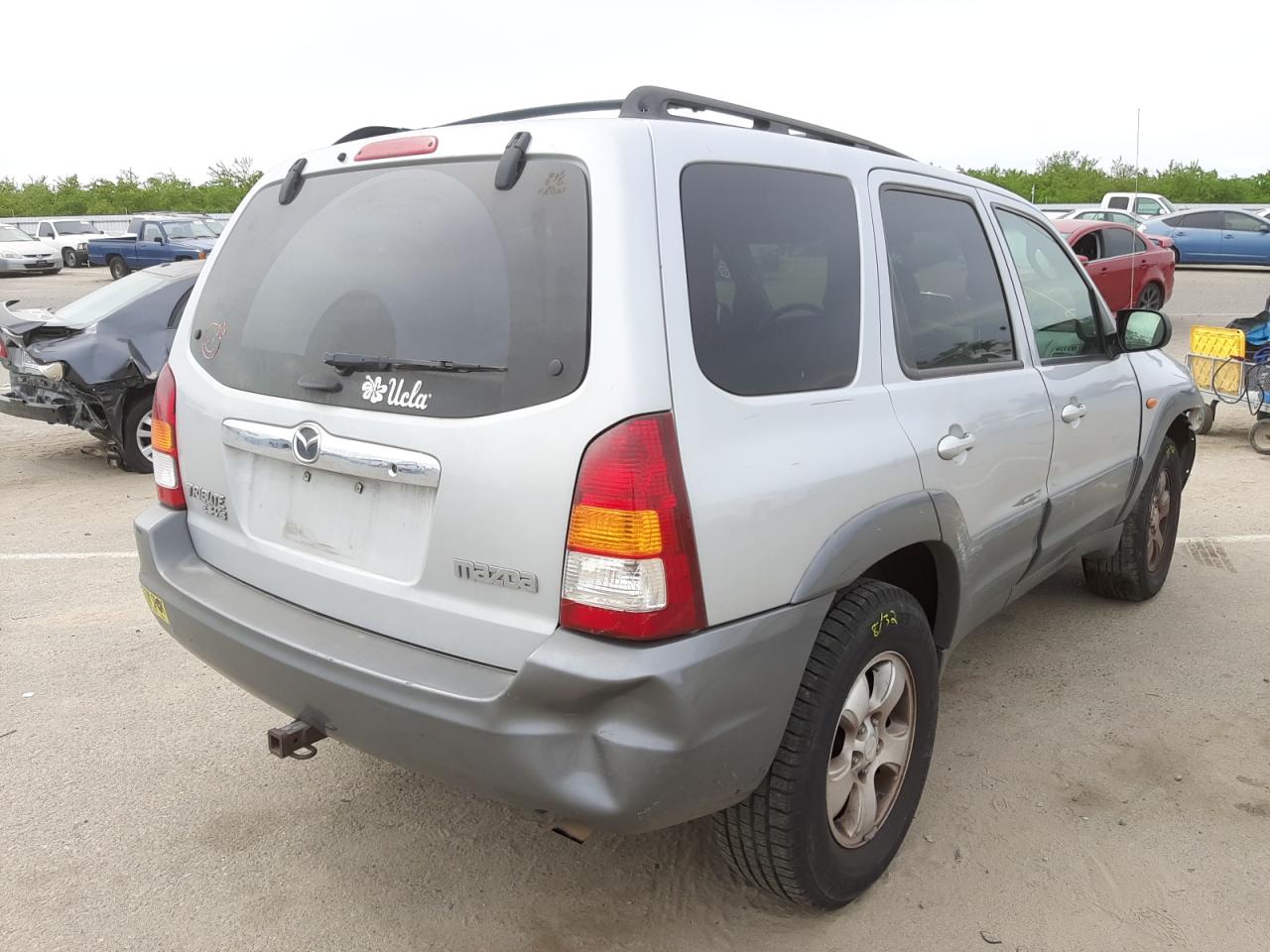Photo 4 from auction – 2002 MAZDA TRIBUTE LX with VIN 4F2CU09142KM51694