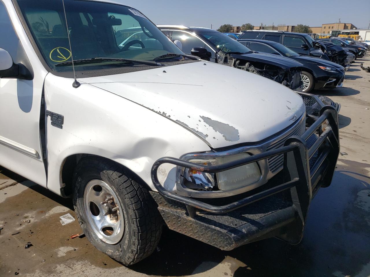 Photo 9 from auction – 2000 FORD F150 with VIN 1FTRX17L4YKB02717