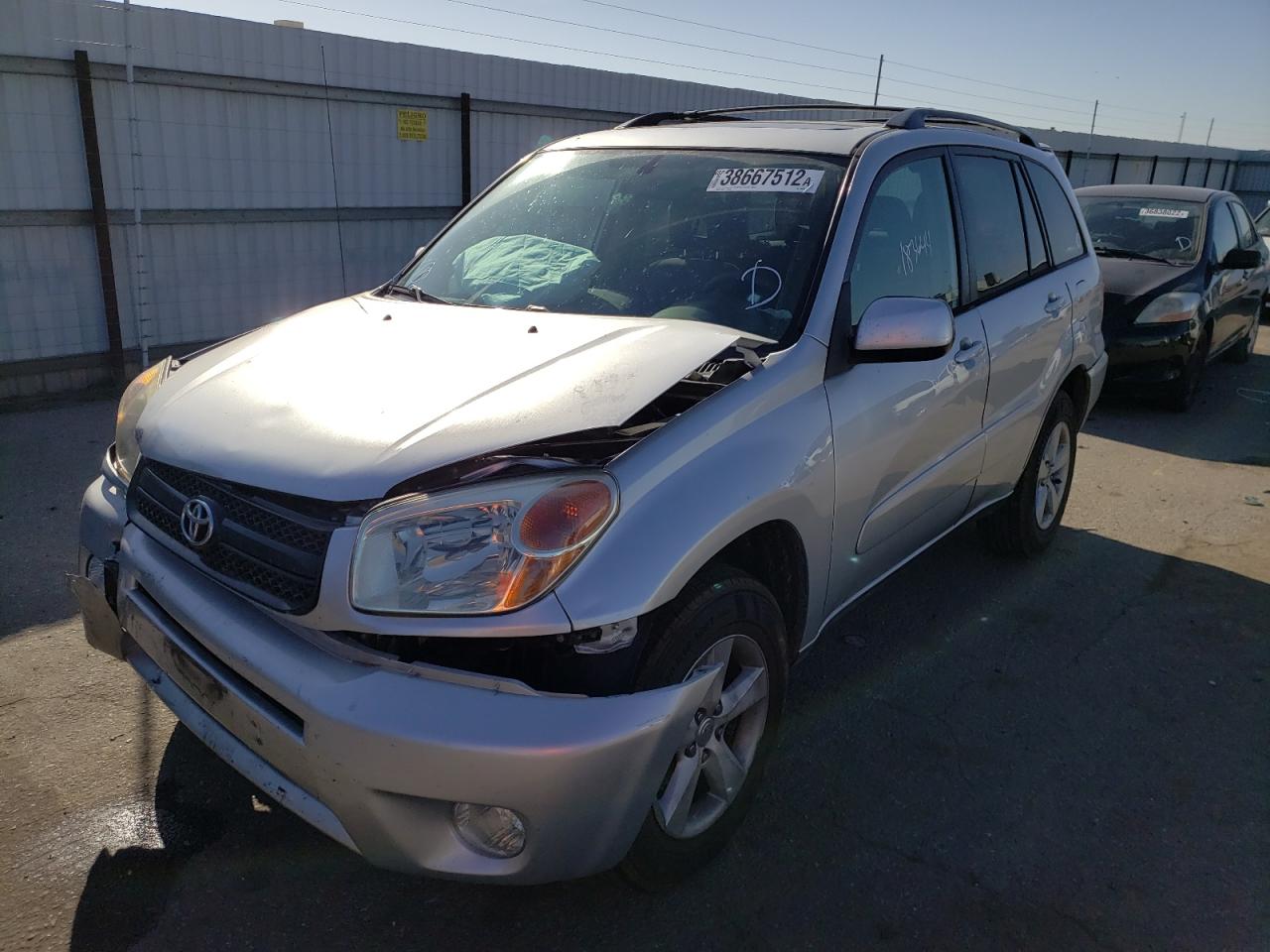 Photo 2 from auction – 2004 TOYOTA RAV4 with VIN JTEGD20V340003549