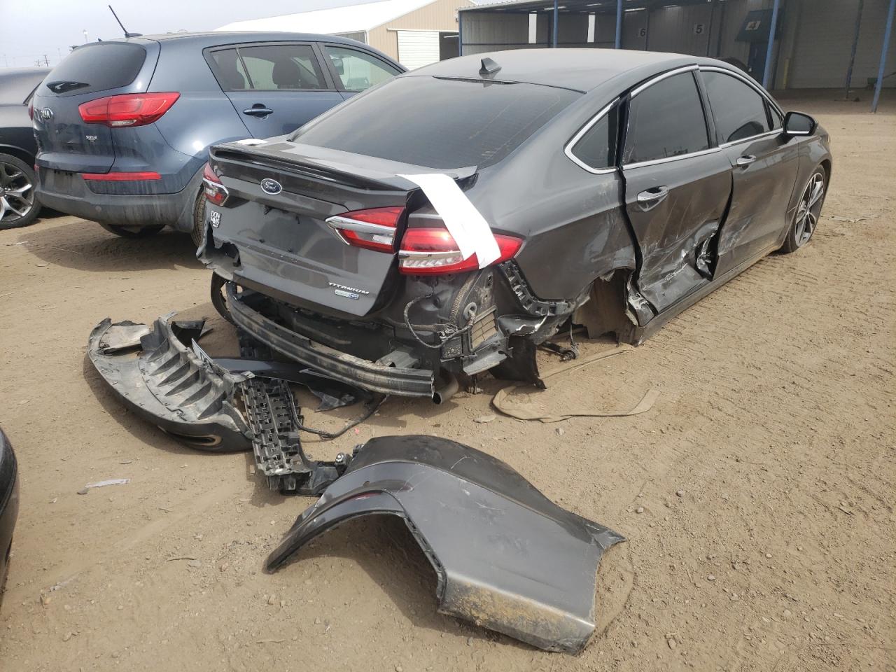 Photo 4 from auction – 2019 FORD FUSION TIT with VIN 3FA6P0D92KR154572