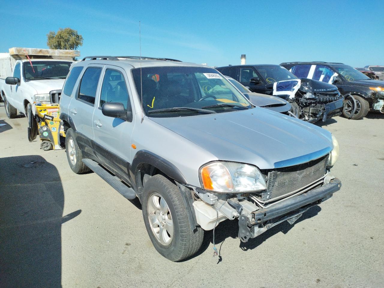 MAZDA TRIBUTE ES 2003 with VIN 4F2CZ96133KM11988 - Photo from auction