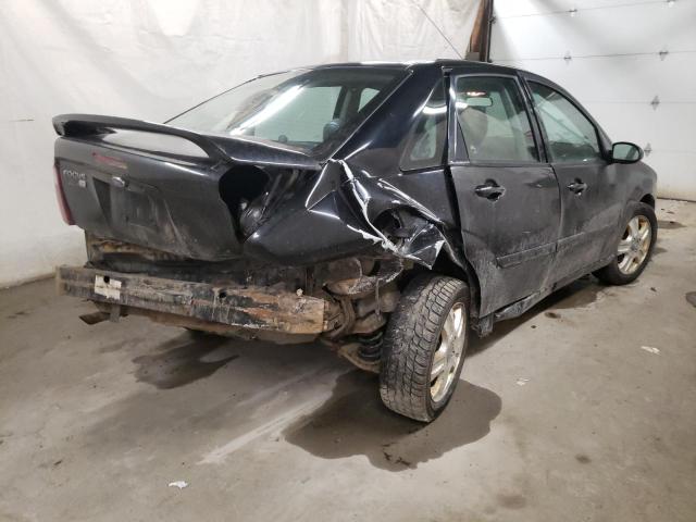 Photo 4 from auction – 2007 FORD FOCUS with VIN 1FAFP38Z47W218739
