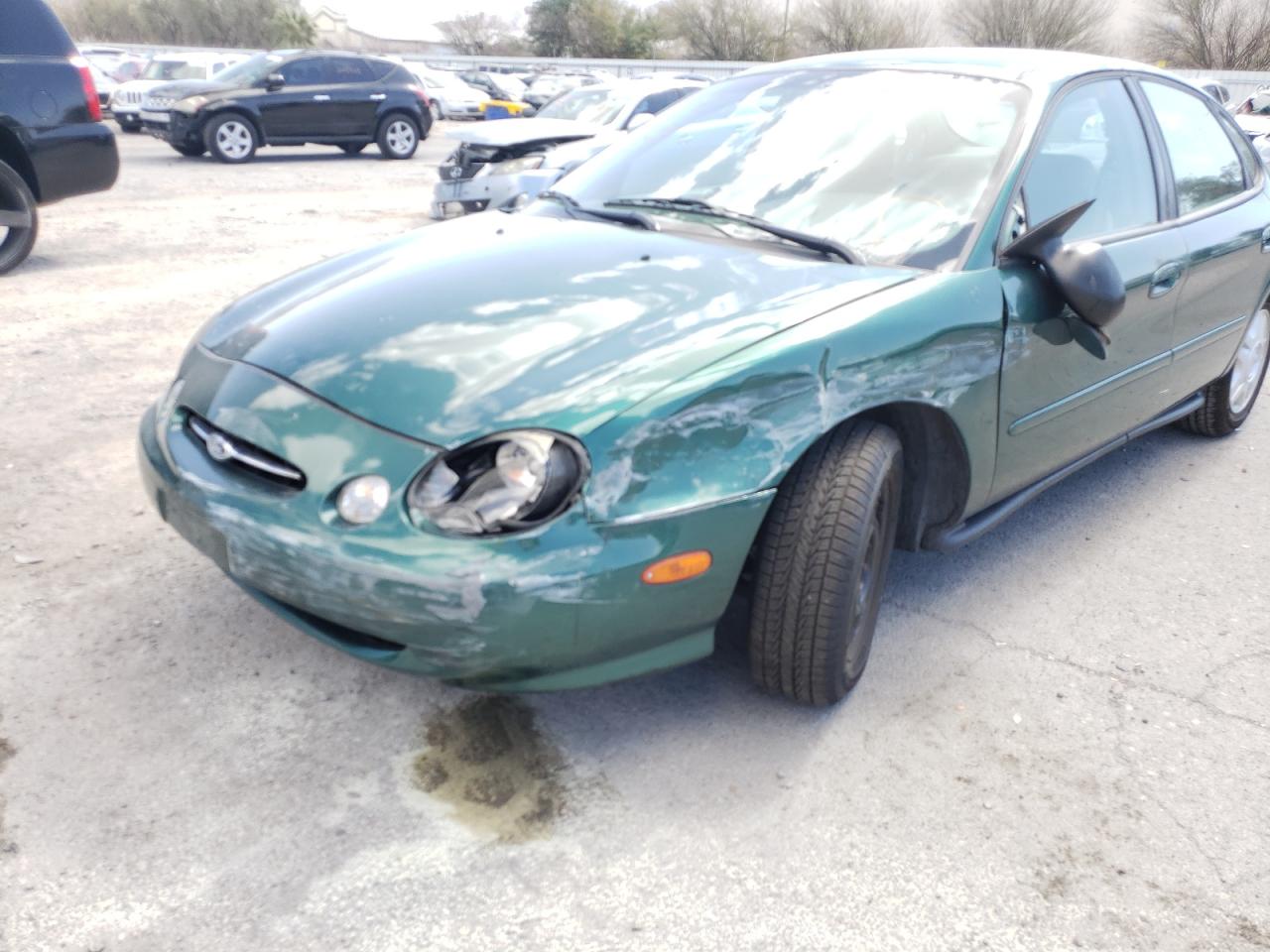 Photo 9 from auction – 1999 FORD TAURUS LX with VIN 1FAFP52U9XA114110
