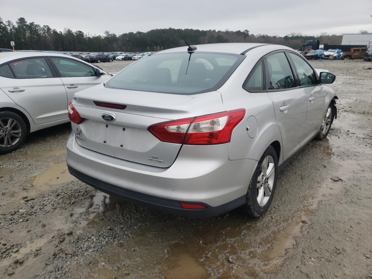Foto 4 de la subasta – 2014 FORD FOCUS SE con VIN 1FADP3F23EL121270