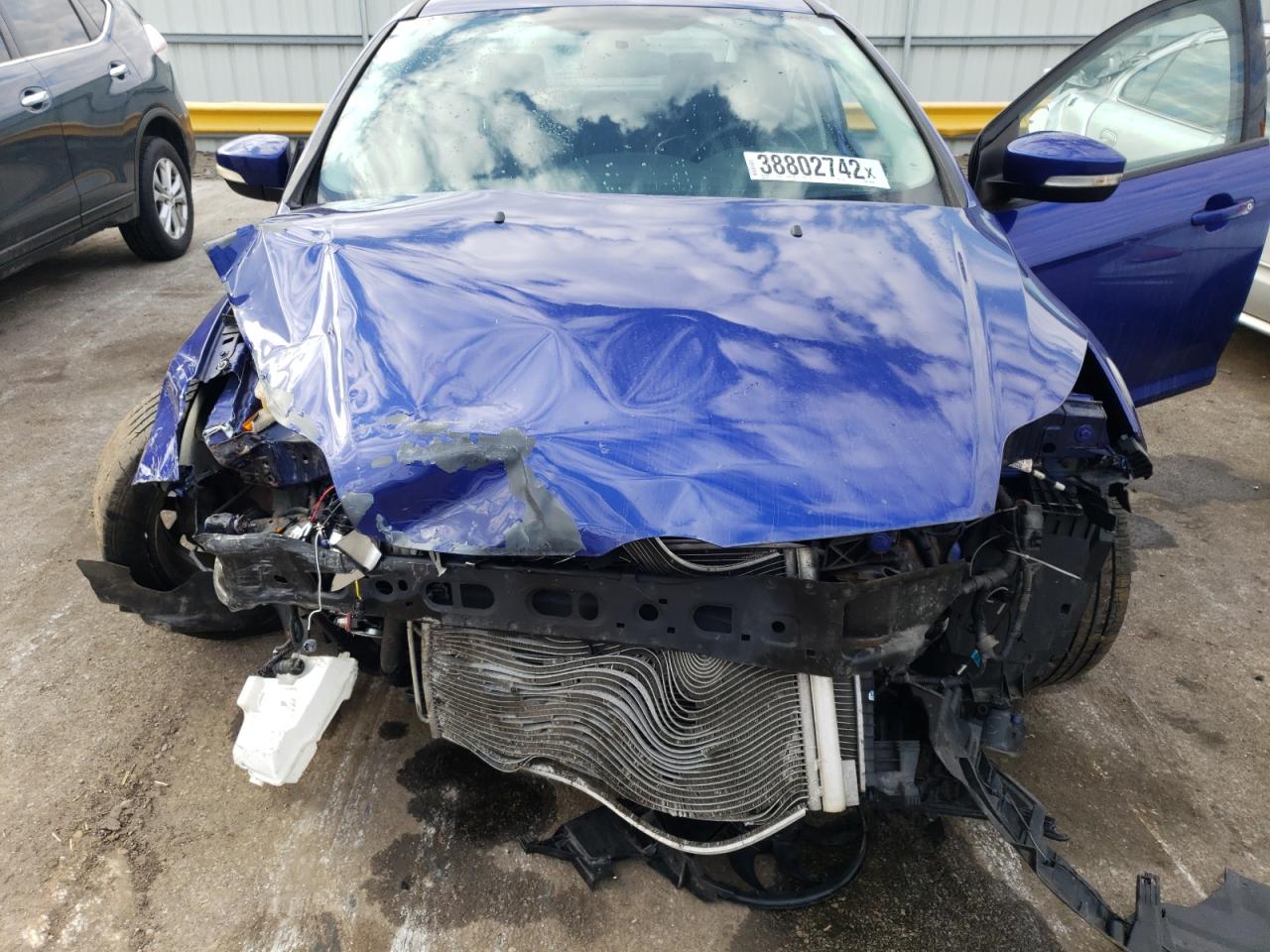 Photo 7 from auction – 2014 FORD FOCUS SE with VIN 1FADP3F2XEL240949