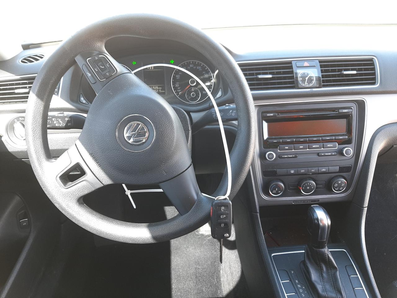 Photo 9 from auction – 2013 VOLKSWAGEN PASSAT S with VIN 1VWAP7A3XDC104501