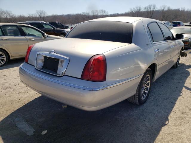 Photo 4 from auction – 2002 LINCOLN TOWN CAR C with VIN 1LNHM83W92Y652945