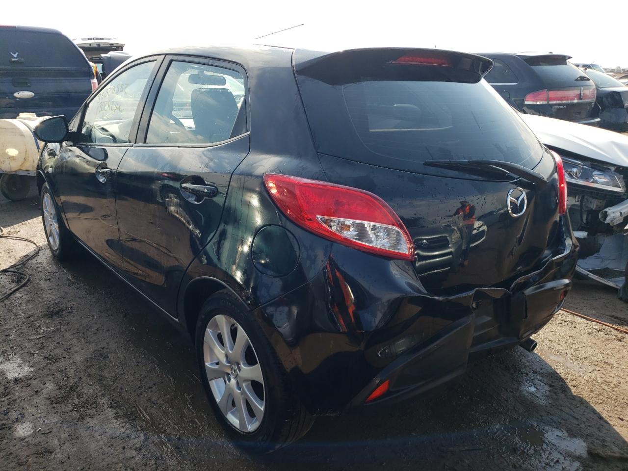 Photo 3 from auction – 2011 MAZDA MAZDA2 with VIN JM1DE1HY5B0130927