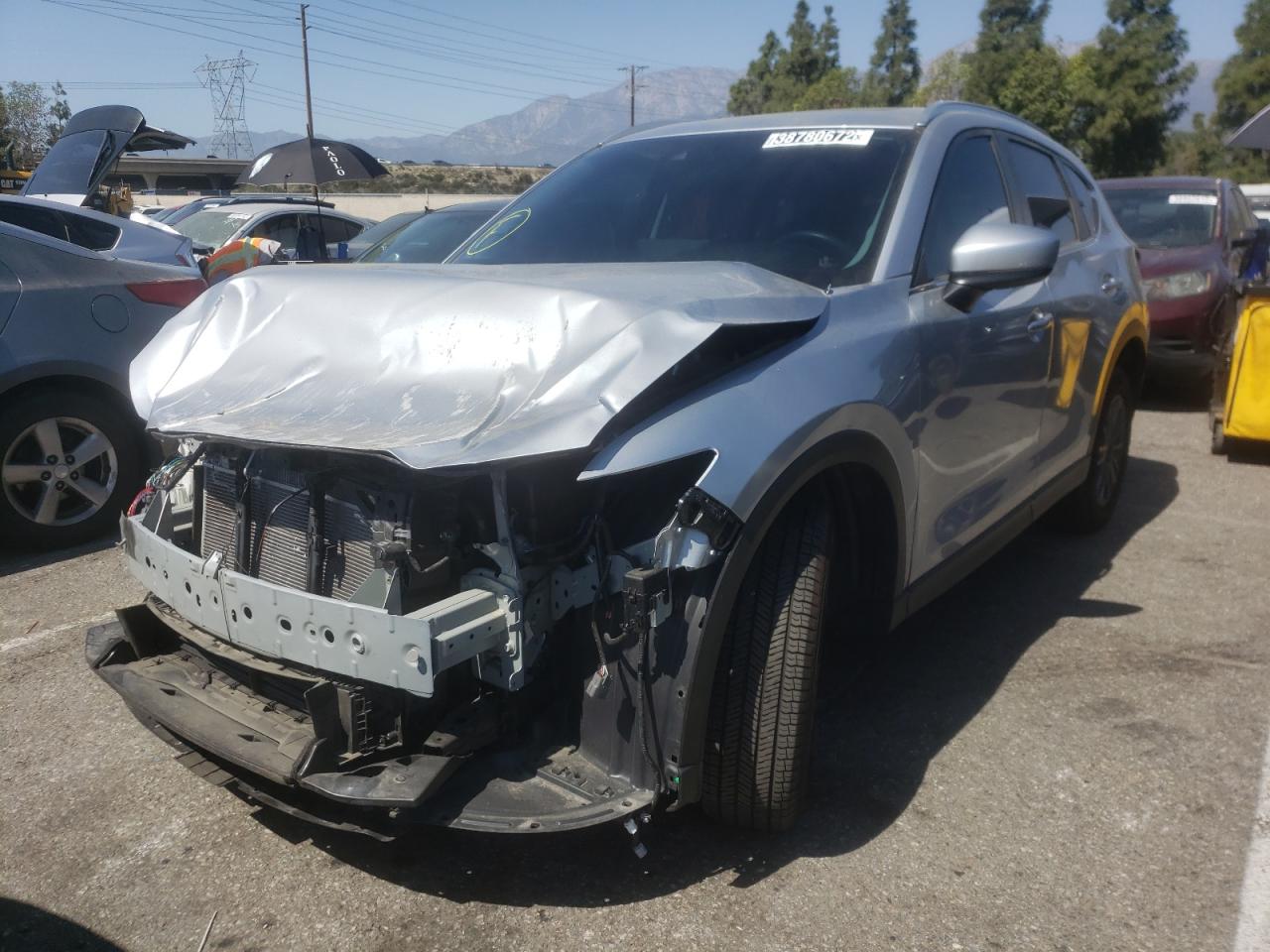 Photo 2 from auction – 2021 MAZDA CX-5 TOURI with VIN JM3KFACM9M1368681