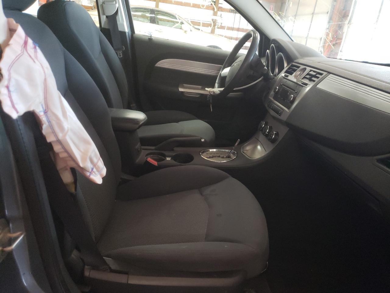 Photo 5 from auction – 2009 CHRYSLER SEBRING TO with VIN 1C3LC56D09N553036