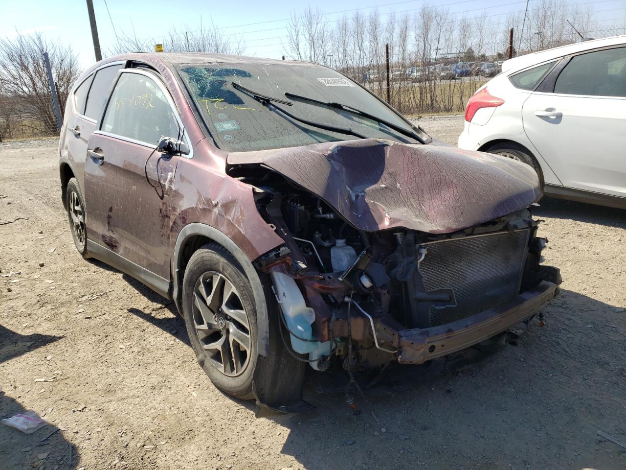 HONDA CR-V SE 2016 with VIN 5J6RM4H40GL075097 - Photo from auction