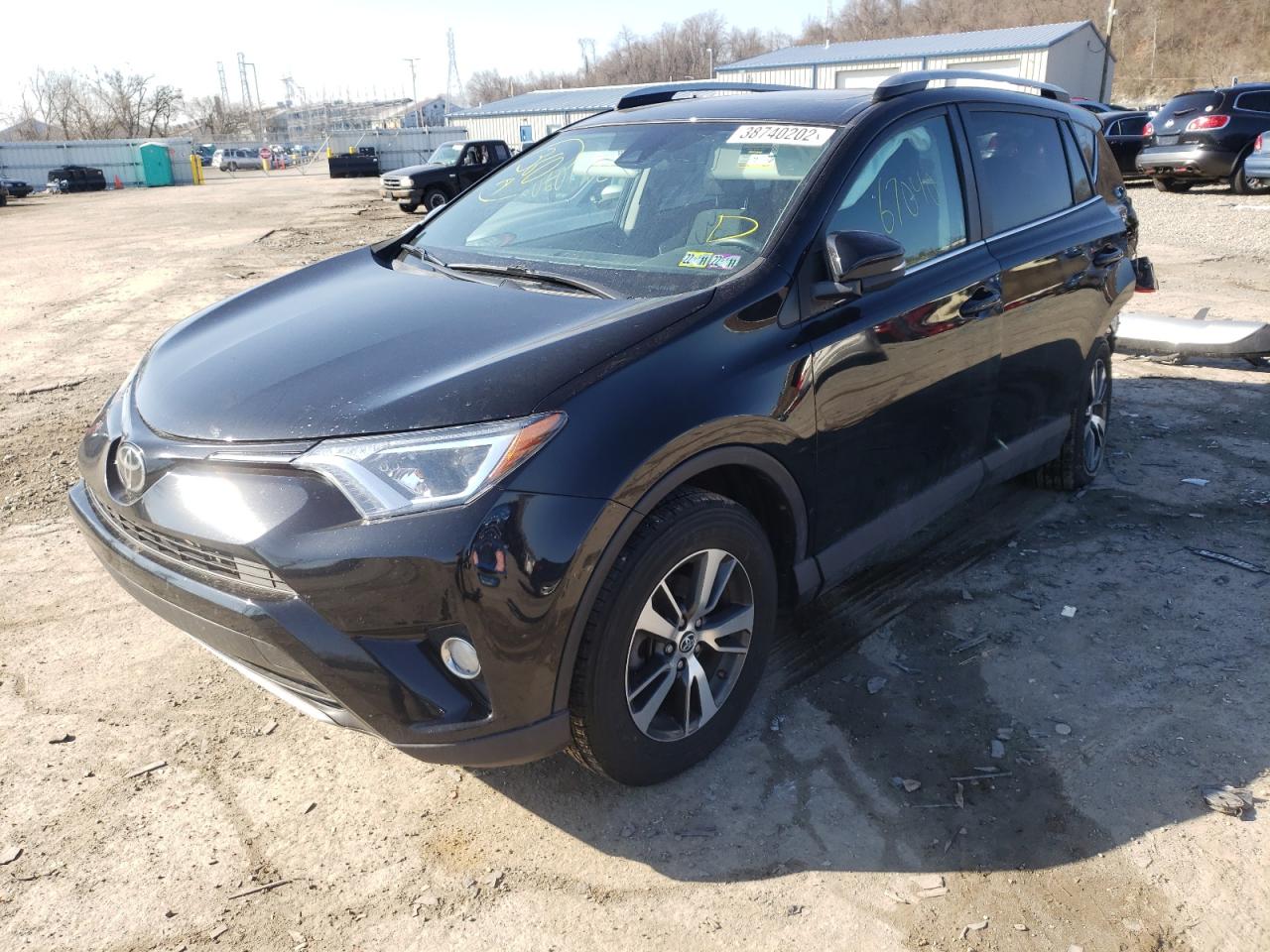 Photo 2 from auction – 2018 TOYOTA RAV4 with VIN 2T3RFREV6JW809529