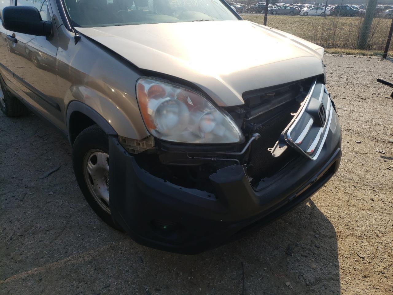 Photo 9 from auction – 2006 HONDA CR-V LX with VIN JHLRD68596C010776