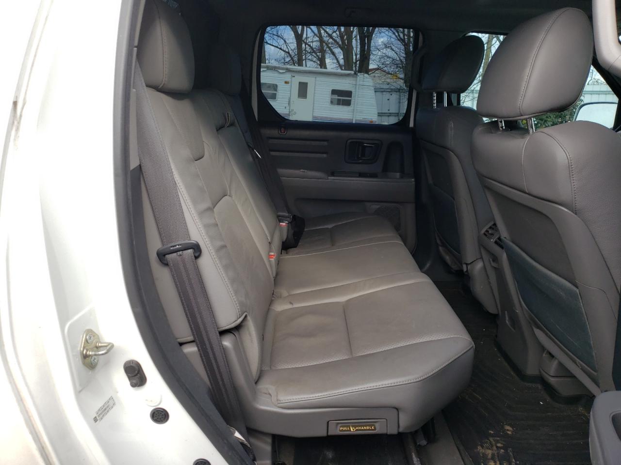 Photo 6 from auction – 2013 HONDA RIDGELINE with VIN 5FPYK1F54DB019011