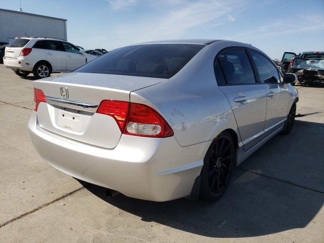 Photo 4 from auction – 2010 HONDA CIVIC LX with VIN 19XFA1F54AE052885