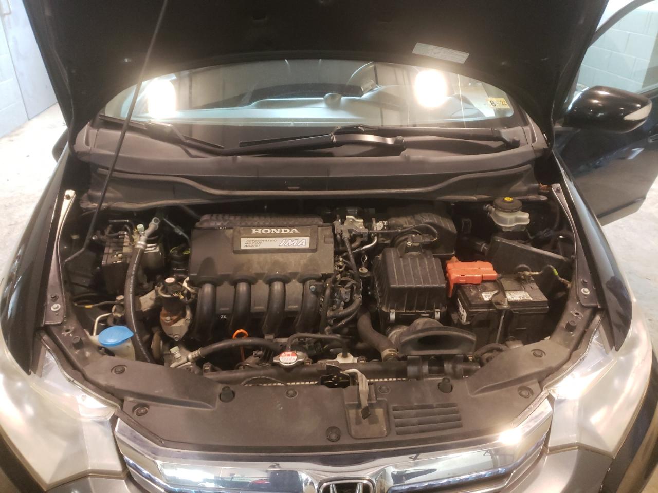 Photo 7 from auction – 2012 HONDA INSIGHT EX with VIN JHMZE2H78CS000177