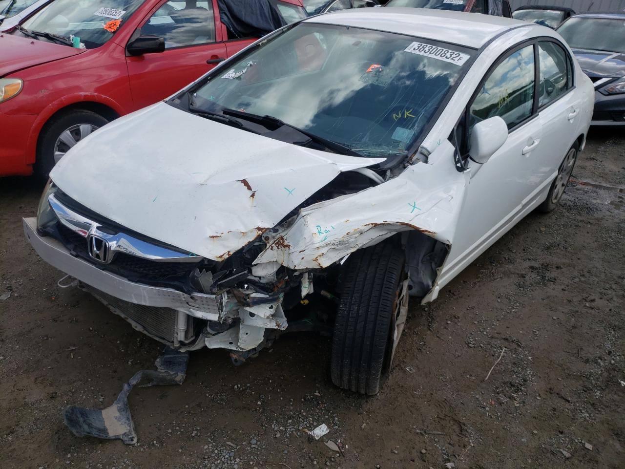 Photo 2 from auction – 2011 HONDA CIVIC LX with VIN 19XFA1F59BE006535