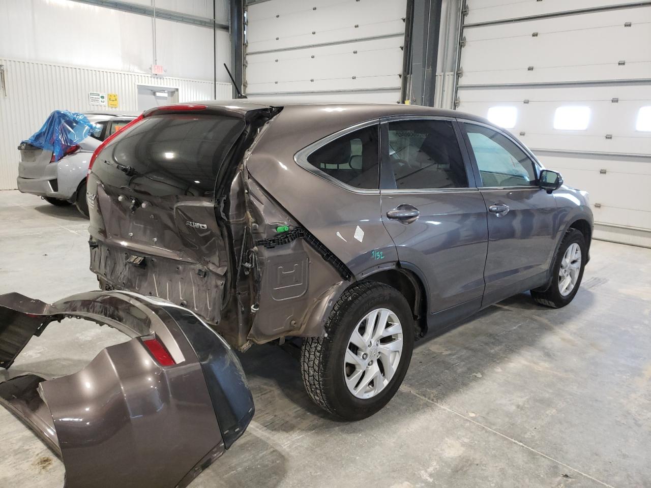 Photo 4 from auction – 2015 HONDA CR-V EX with VIN 2HKRM4H56FH687810