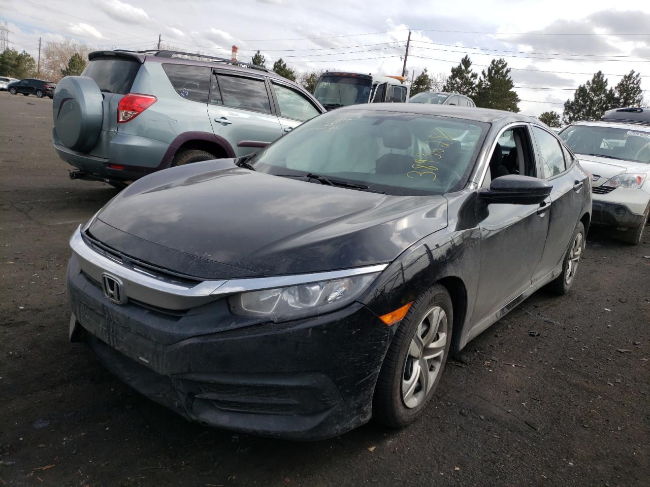 Photo 2 from auction – 2016 HONDA CIVIC LX with VIN 19XFC2F51GE066395