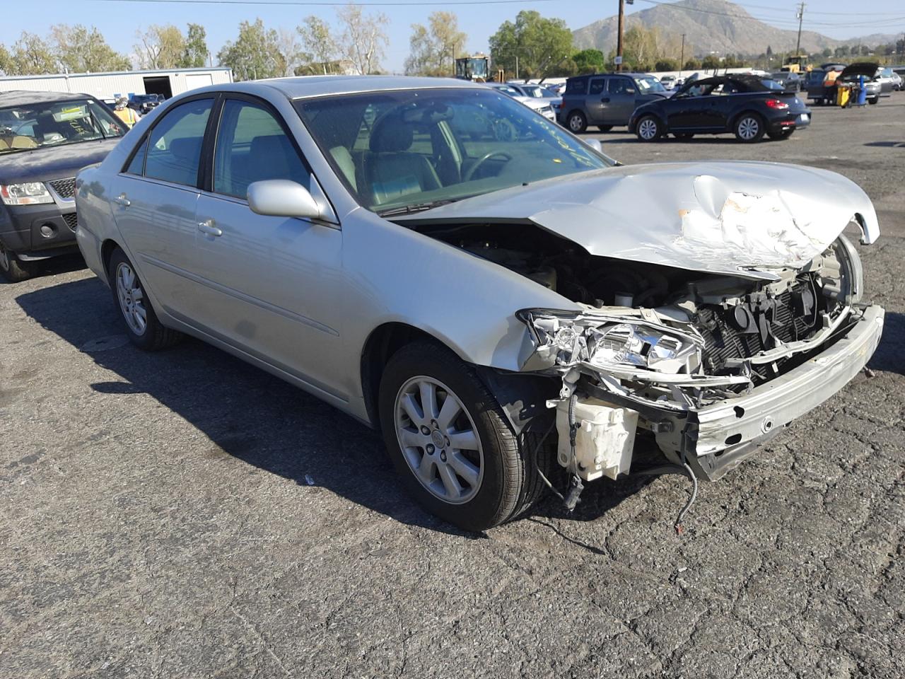 TOYOTA CAMRY 4D 2 2002 with VIN JTDBF30K820015018 - Photo from auction