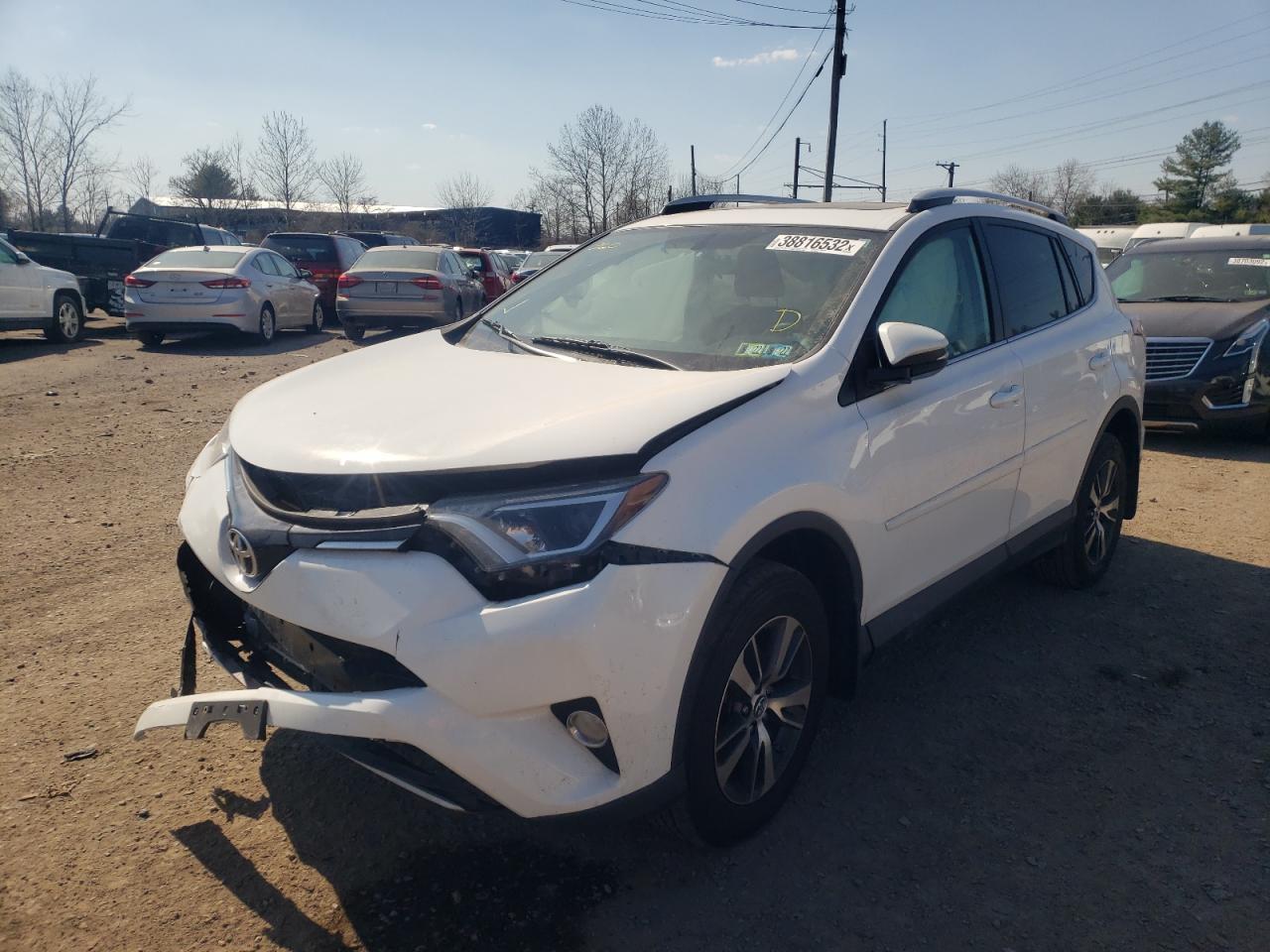 Photo 2 from auction – 2016 TOYOTA RAV4 XLE with VIN 2T3RFREV8GW488408